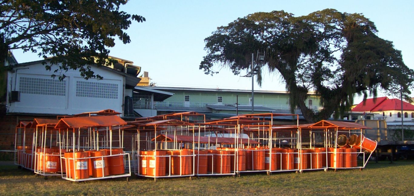 78_SC-Med_Couva Joylanders_The bass drums gleam in the sunset_20150125_tobagojo@gmail.com_100_5068B_1366w_647h.jpg